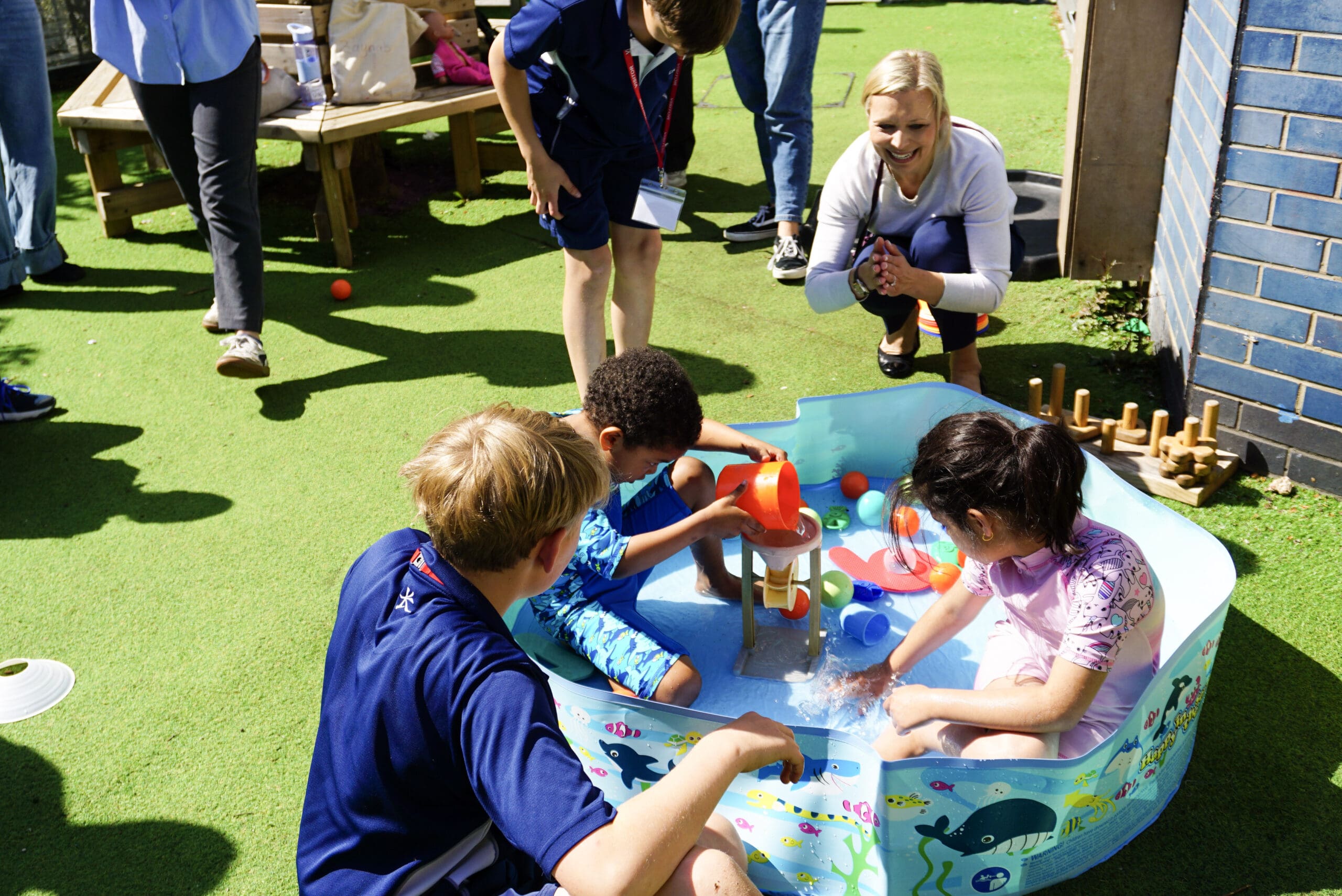 A post-it compliment that reads: "Ria, I learn so much from you every day. You are amazing to work with."